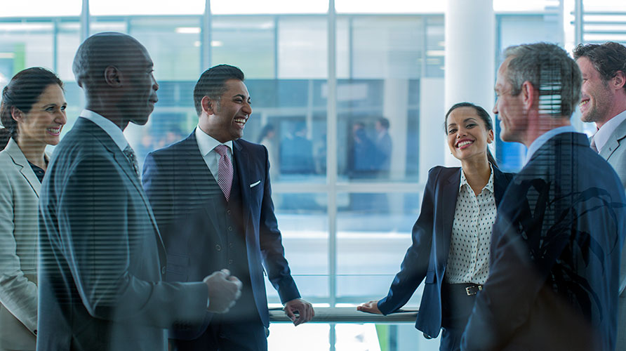group of diverse colleagues having a conversation
